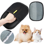 Black FurGlove deshedding mitt with textured grooming surface